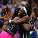USA’s Sloane Stephens, right, hugs USA’s Coco Gauff after winning their 2021 US Open Tennis tournament women’s singles second-round match at the USTA Billie Jean King National Tennis Center in New York, on September 1, 2021.